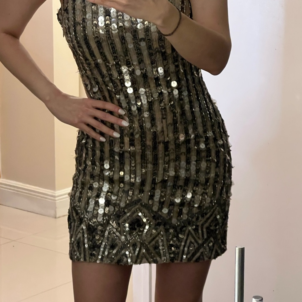 BEBE Luxurious and sophisticated cocktail dress made in India